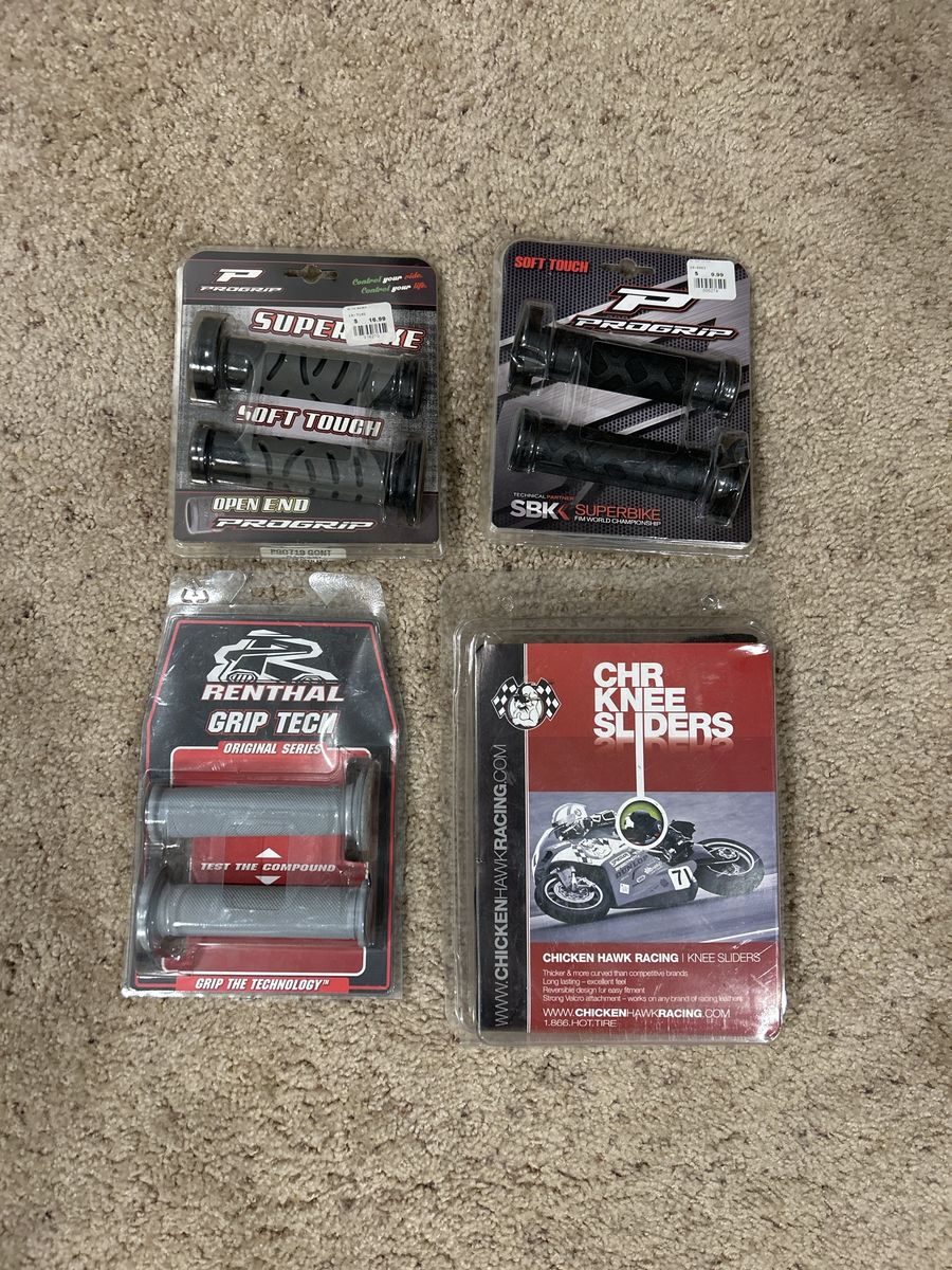 Motorcycle grips, and knee sliders