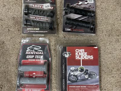 Motorcycle grips, and knee sliders