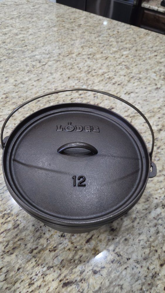 Lodge #12 Deep Cast Iron Camp Dutch Oven with Lid.