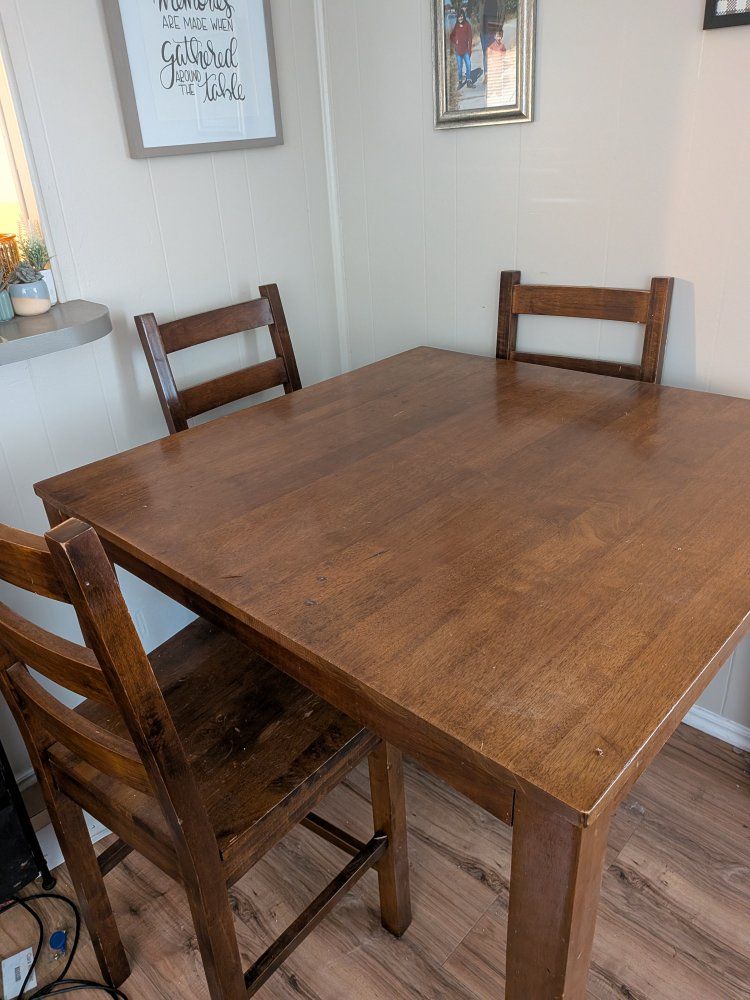 Four chair high top table $100