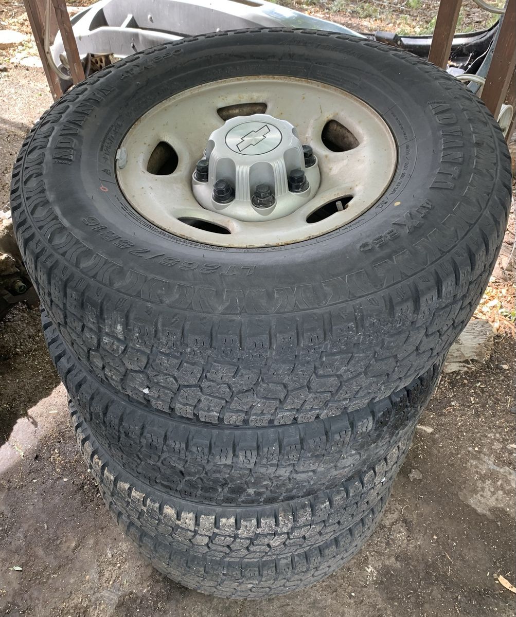 265/75-16 10-ply tires & 8x165.1 wheels set of 4