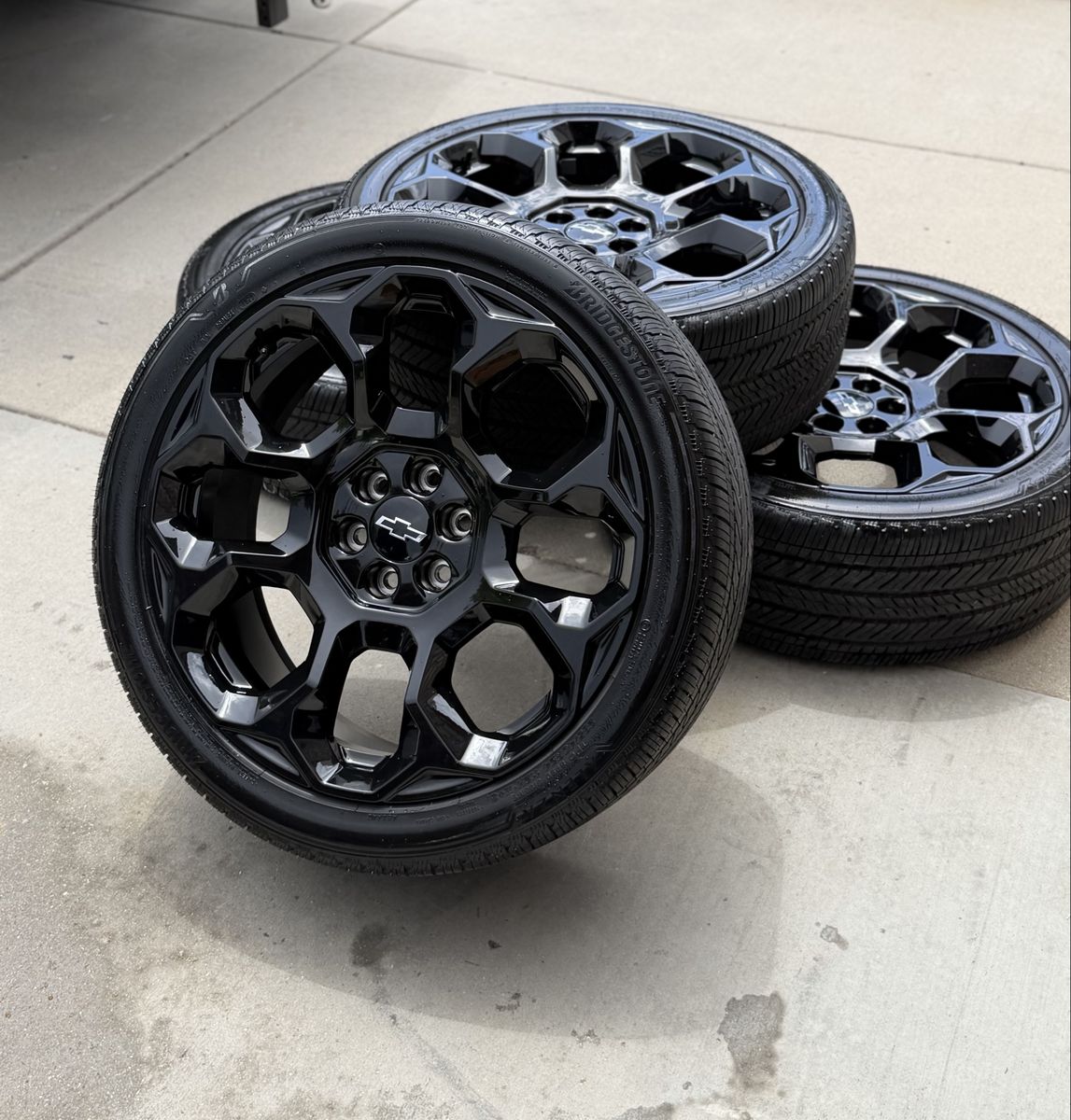 Brand new 2026 Chevy Tahoe high country 24” gloss black wheels and tires