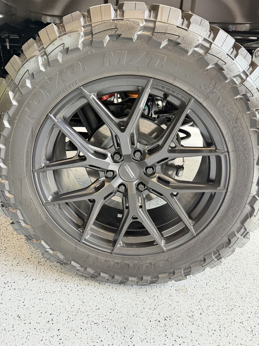 Vossen wheels 22x9.5 on Toyo MT 37”.