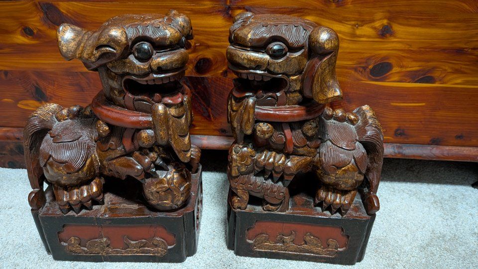 Vintage Chinese hand carved wooden foo dogs