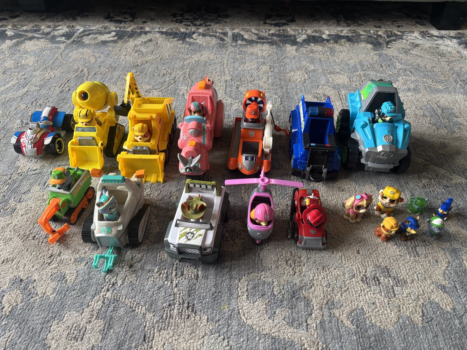 Lot of Paw Patrol Vehicles and Figurines