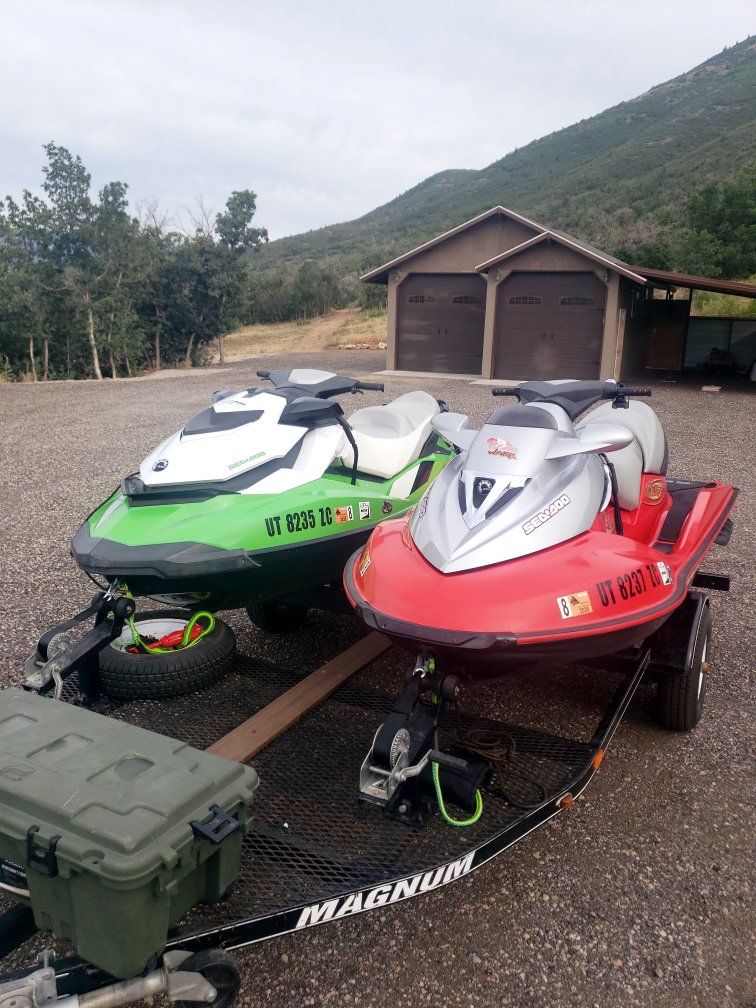2013, 2005 Sea doos, & trailer