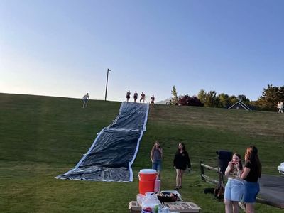 Build a Giant Slip N Slide This Summer