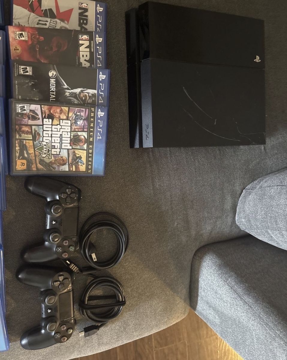 Sony PlayStation 4 (PS4) Console, 2 Controllers & 13 Games - Black