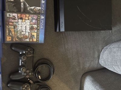 Sony PlayStation 4 (PS4) Console, 2 Controllers & 13 Games - Black