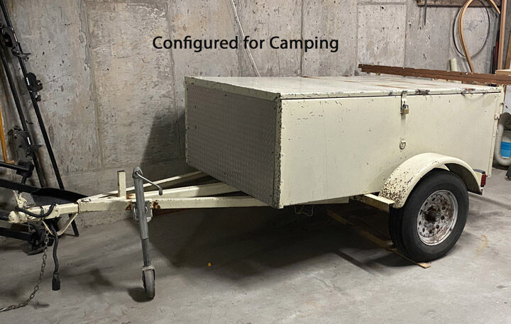 Unique car-camping and boat-carrying trailer