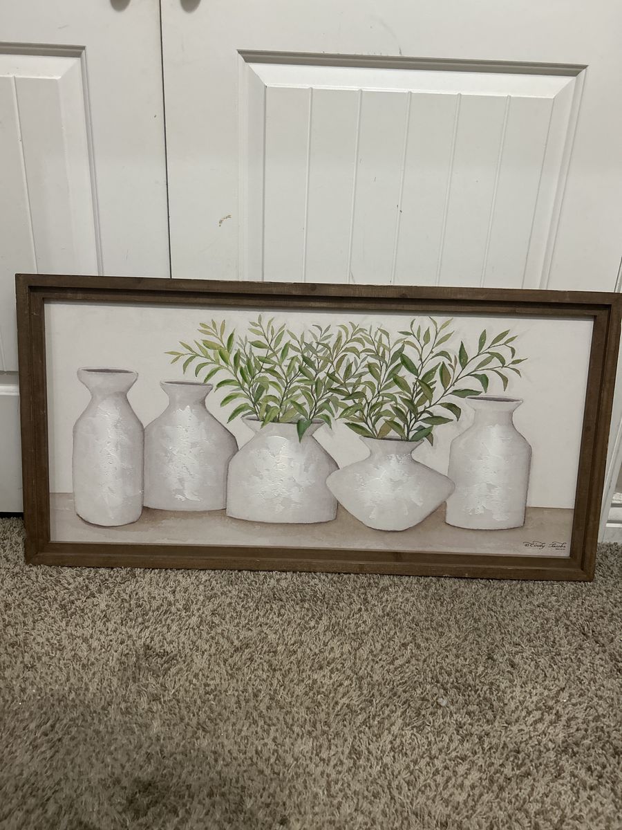Pottery and plant wall hanging