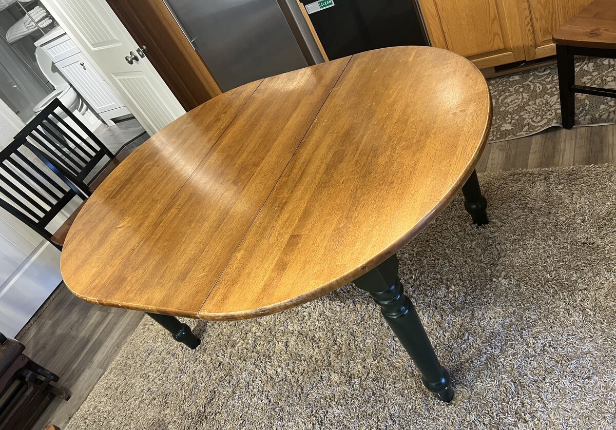 Solid wood dining table with leaf