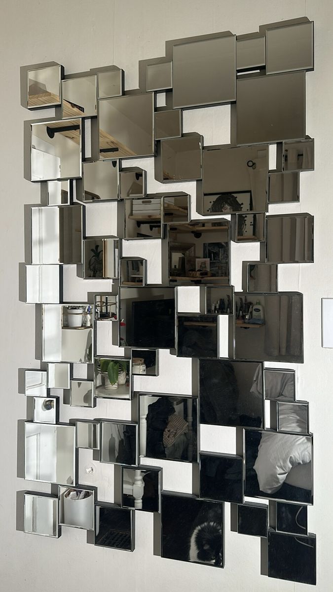 Large artisan modern mirror in silver (55inx33in) $1100 OBO