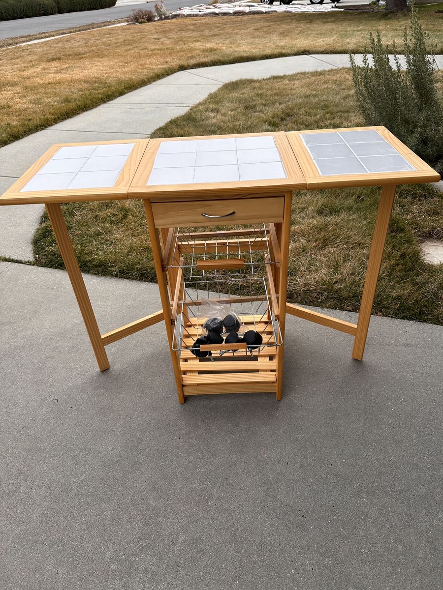 Space Saving small adjustable table