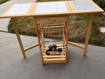 Space Saving small adjustable table