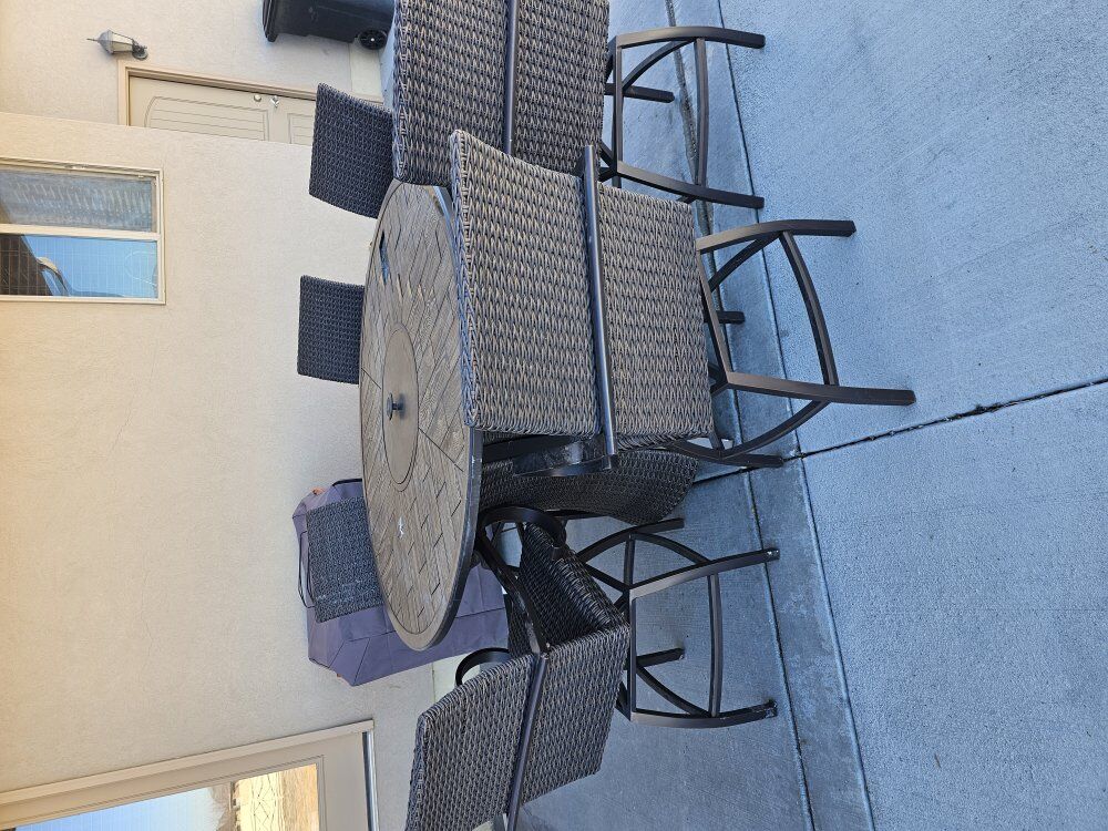 outdoor firetable with 6 chairs