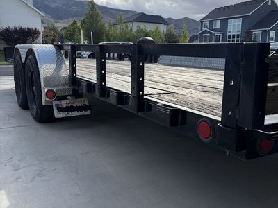 Heavy Duty Dual Axle Flatbed Utility Trailer with Wood Decking fitting 2 side by sides 83 1/2” x 22’