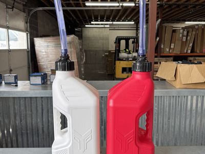Red and white Tuff Jug 2.5 gal fuel tank