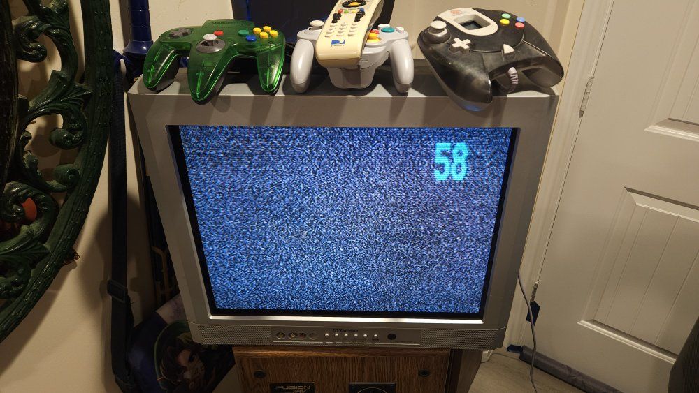 20 inch flat screen CRT + universal remote.