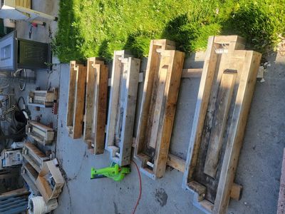 Wood frames for garden boxes, 3 filled with cement