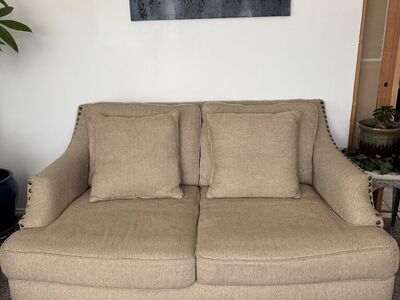 Tan Loveseat With Nailhead Trim