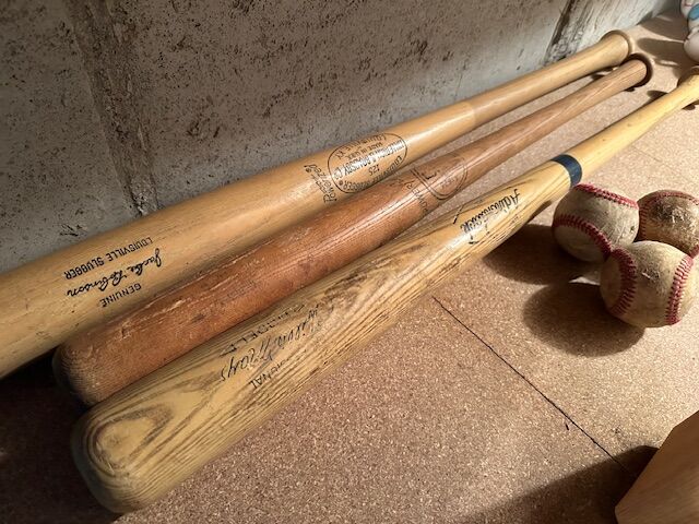 Vintage baseball bats and balls