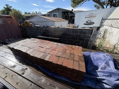 Close to 1500 red bricks .50 cts each 8x4x2