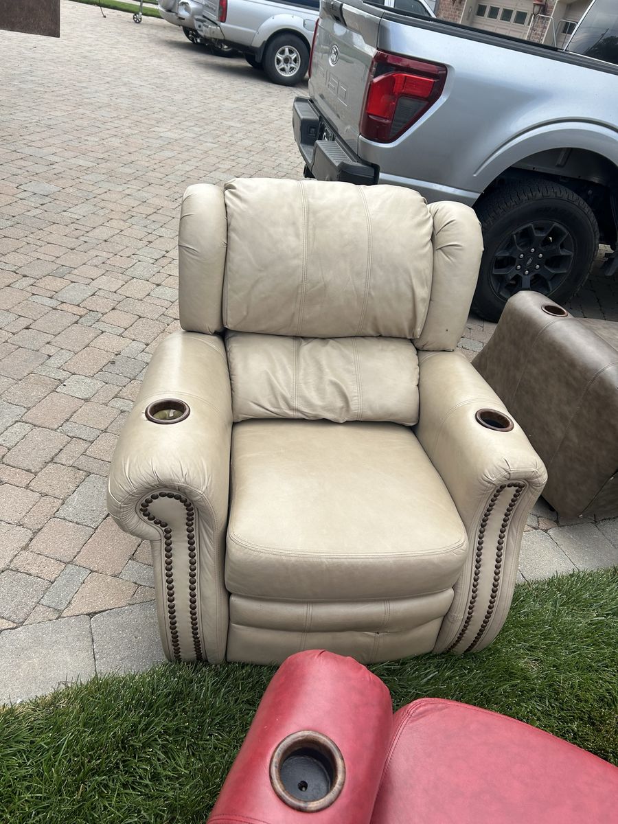 Beige Leather Recliner Armchair with Cup Holders and Nailhead Trim