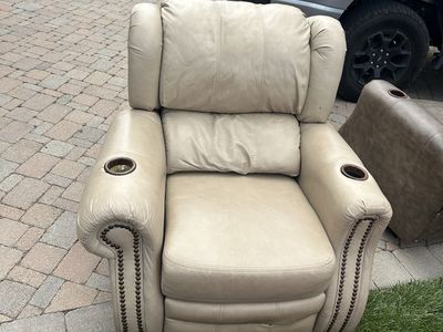 Beige Leather Recliner Armchair with Cup Holders and Nailhead Trim