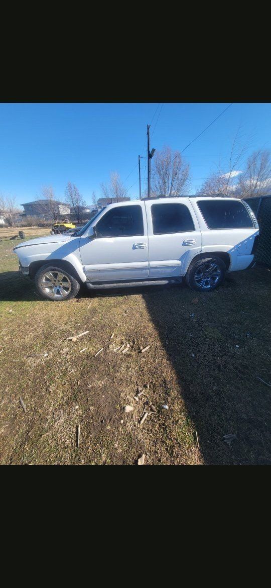 2003 CHEVY TAHOE FOR PARTS. COME GET YOURS. BAD M OTOR . ALL GOOD BODY PARTS. 2004 chevy suburban runs well . DRIVE IT HOME.
