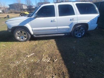2003 CHEVY TAHOE FOR PARTS. COME GET YOURS. BAD M OTOR . ALL GOOD BODY PARTS. 2004 chevy suburban runs well . DRIVE IT HOME.