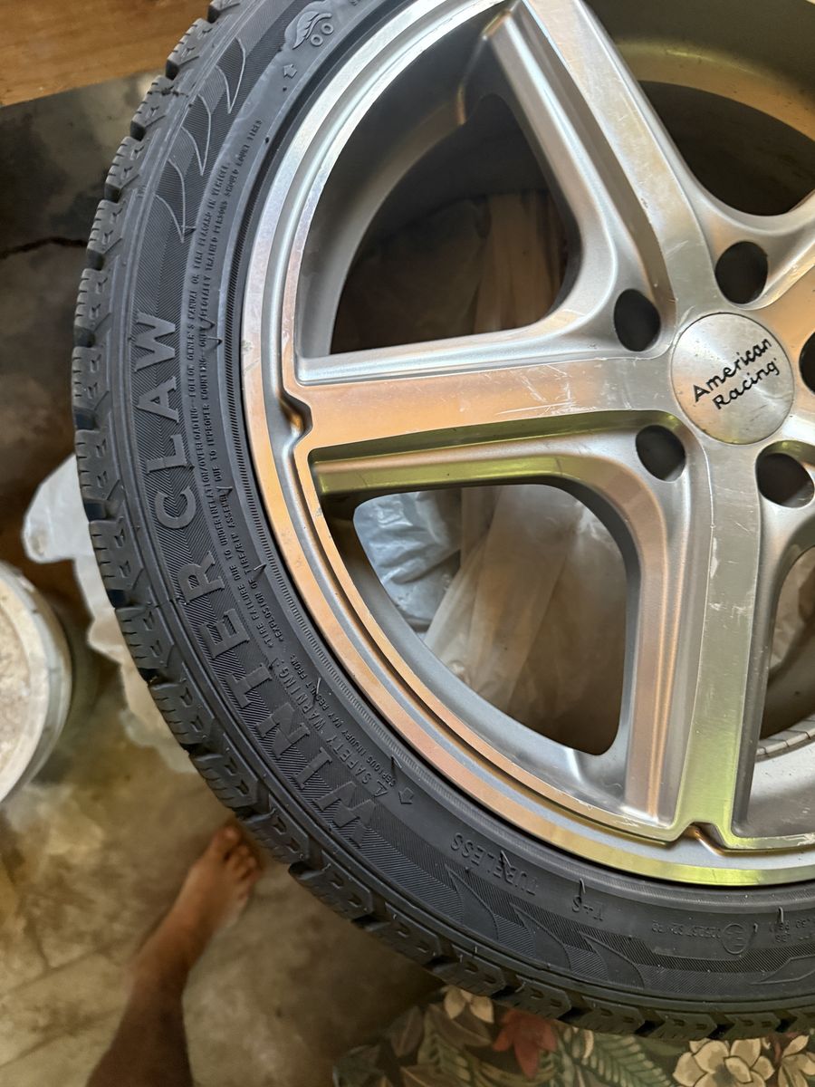 American Racing Wheel with Winter Claw Studded Tire