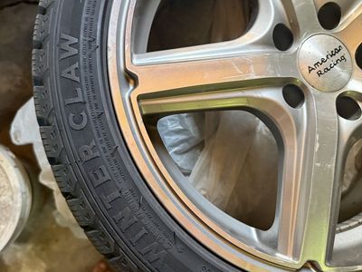 American Racing Wheel with Winter Claw Studded Tire