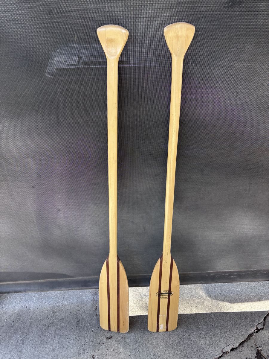 Two wooden oars $20