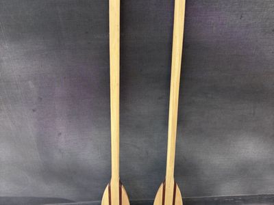 Two wooden oars $20