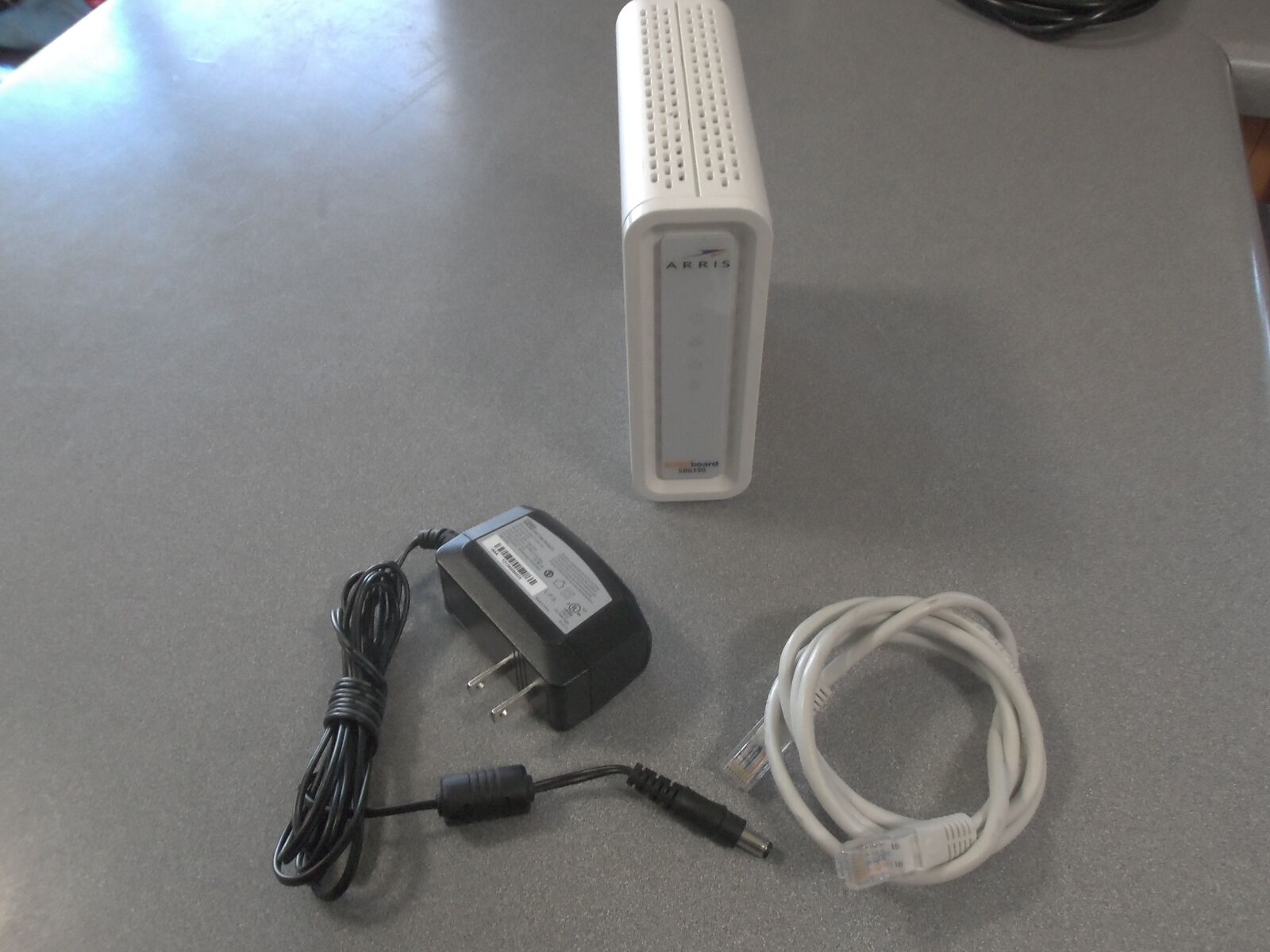 Arris SurfBoard modem with TP-Link wireless router