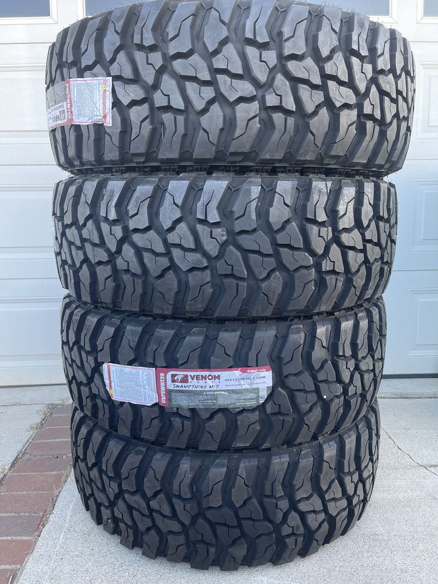 Four brand new 40X13.50R20 Venom Power Swampthing Mud Terrains.