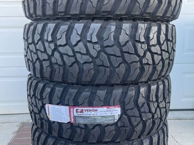 Four brand new 40X13.50R20 Venom Power Swampthing Mud Terrains.