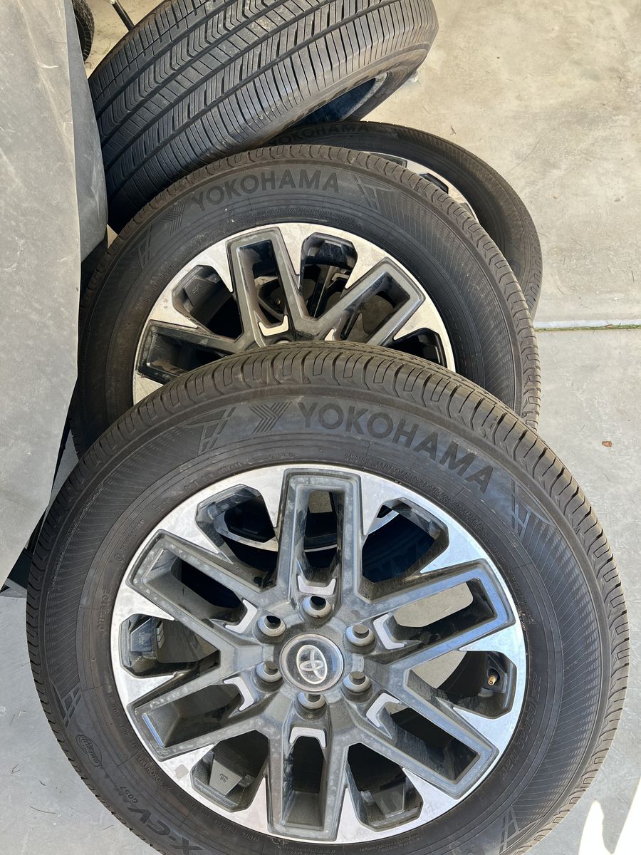 Set Of 4 Yokohama Geolandar tires and Wheels