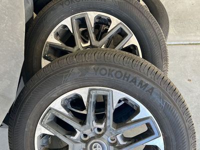 Set Of 4 Yokohama Geolandar tires and Wheels