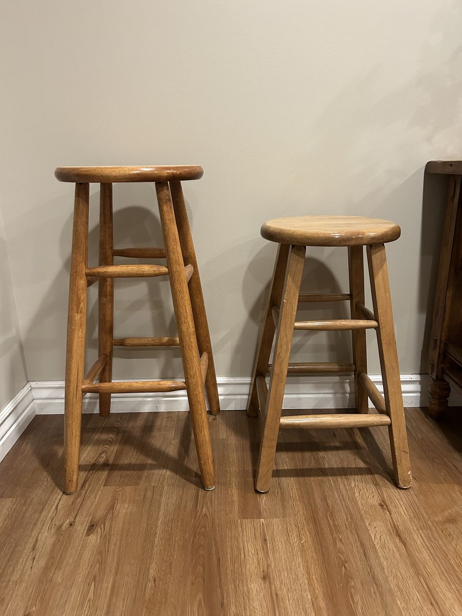 4 Wooden Bar Stools - 2 of each size.  24" & 30” Heights - Natural Wood Finish, Round Seats