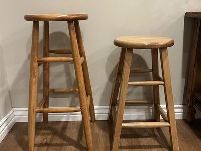 4 Wooden Bar Stools - 2 of each size. 24" & 30” Heights - Natural Wood Finish, Round Seats