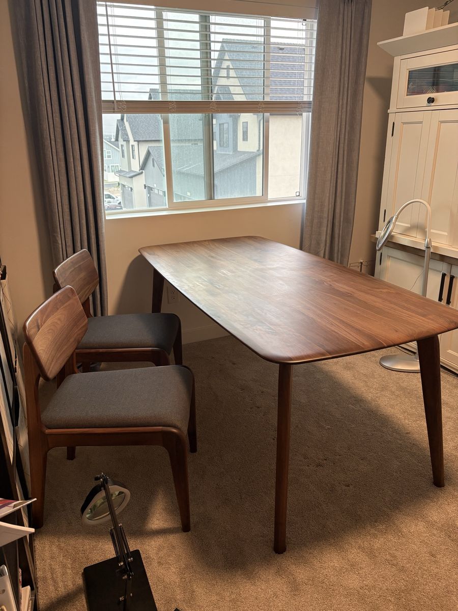 Modern Wooden (walnut) Dining Table with Rounded Corners and four chairs. Made by Castlery