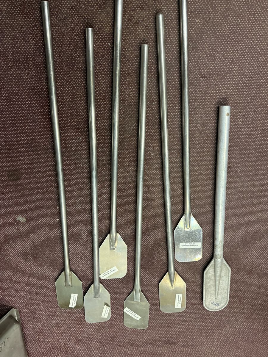 Used 48” tall stainless steel paddle or spatula in excellent condition $50-$75 each