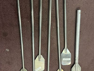Used 48” tall stainless steel paddle or spatula in excellent condition $50-$75 each