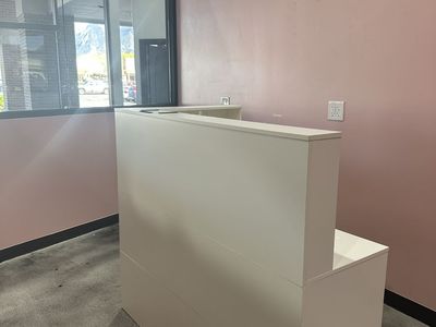 Office desk with filing cabinet