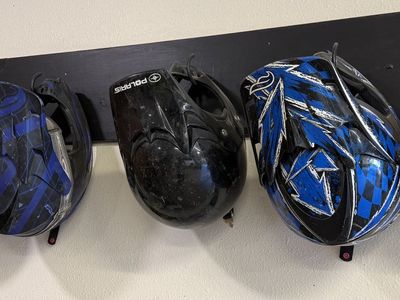 Six snowmobile helmets
