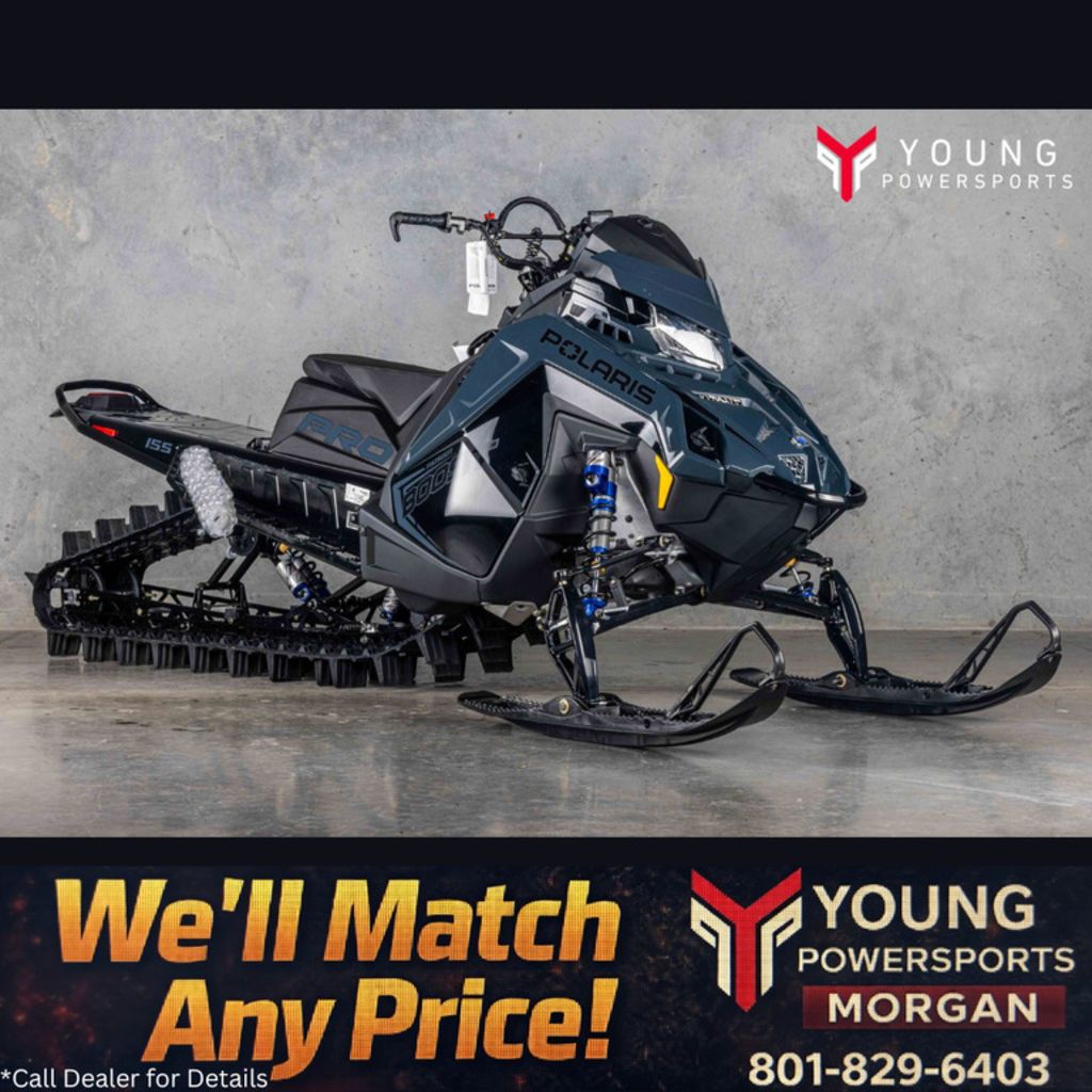 2026 Polaris® Patriot Boost PRO RMK 155 Gloss Black / Blue Dusk