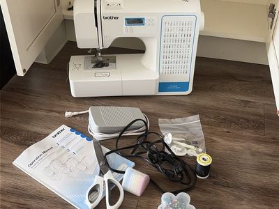 Brother CE1008 Computerized Sewing Machine with Manual and Accessories