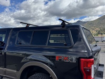 ARE CX Revo Truck Topper (Black) with Roof Rack - Fits 2017+ Ford F-250/F-350 Short Bed (6'9")